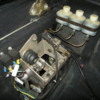 8ma1046 pedal box and latches.: bracket has the chassis number stamped in it, not visible when mounted.