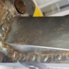 Radiator support bracket spot welded